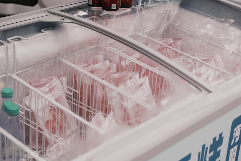 Frozen food packages in a supermarket freezer